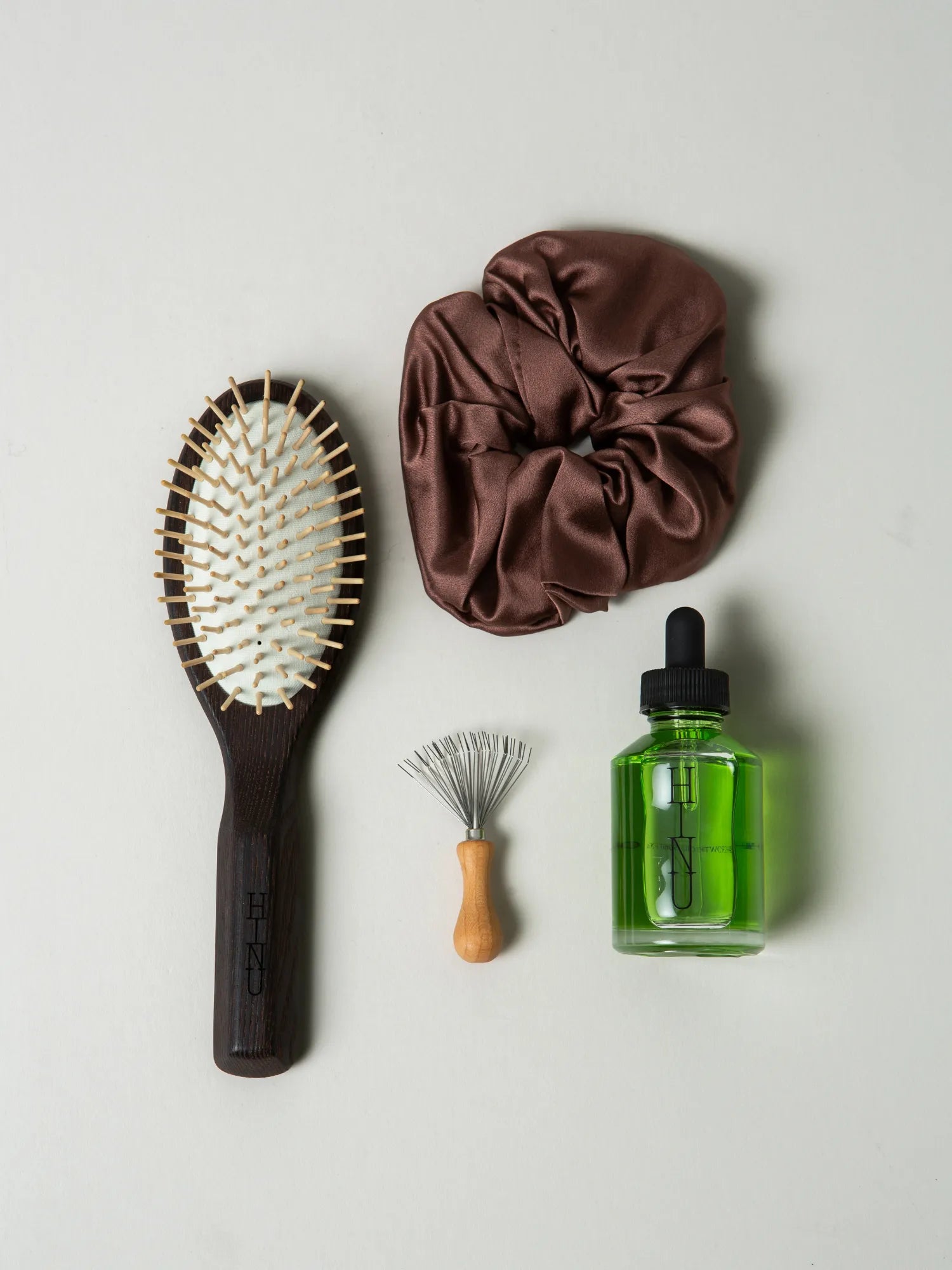 HINU Foundational Kit with wooden brush, cleaner, Hair Growth Oil and brown scrunchie